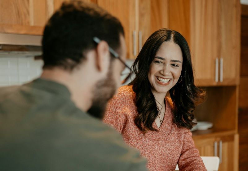 The Townhomes at Chapel Watch Village with a happy couple cooking together in the kitchen